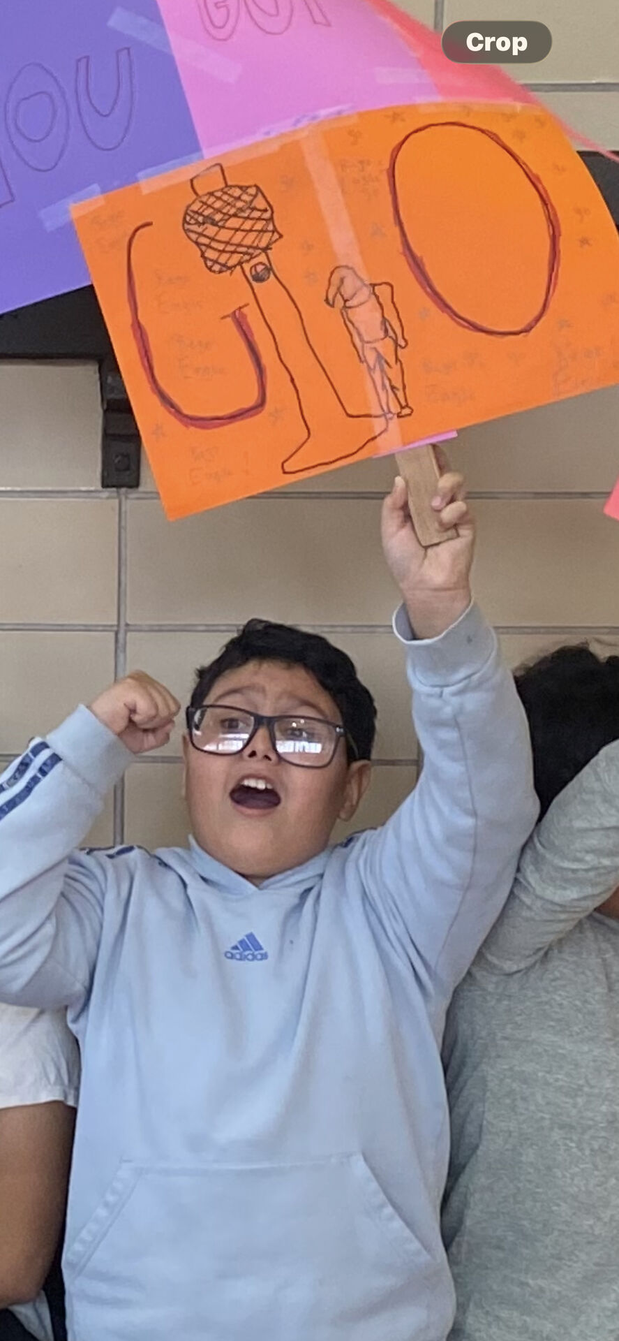 Student cheering at sports event